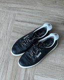 Chanel black leather sneakers